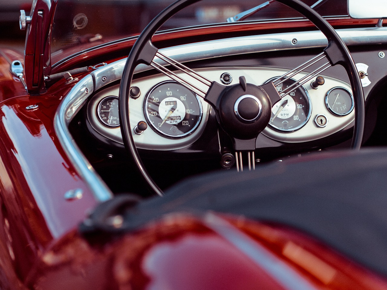Connect with ARMO on Social Media to Engage with the Automotive Restoration Community - image of a dash of a older convertible roadster. 