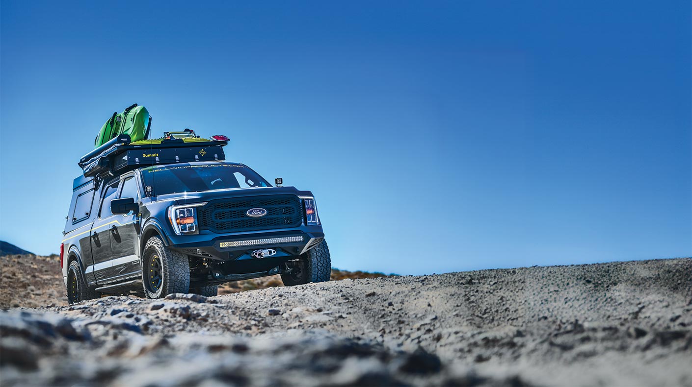 FORD overland vehicle traversing rough terrain