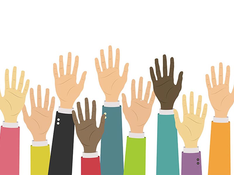 Group of diverse hands raised