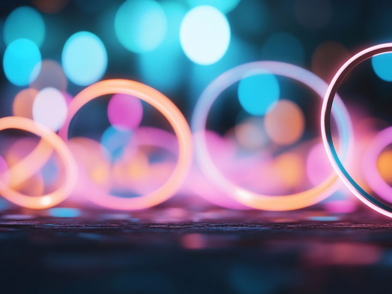 Glowing rings with blurred background of lights
