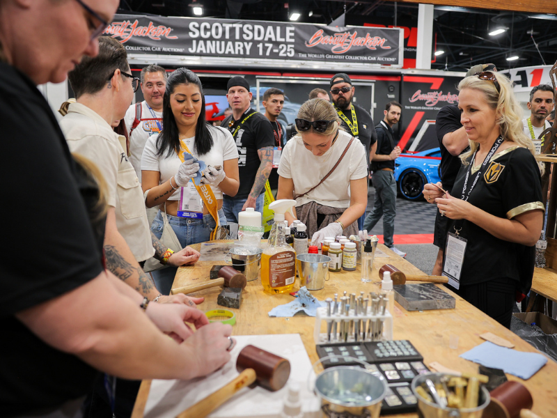 People gathered around table at SBN Booth