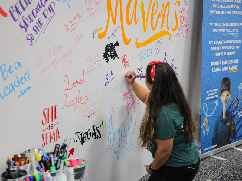 Woman leaving a message on a whiteboard
