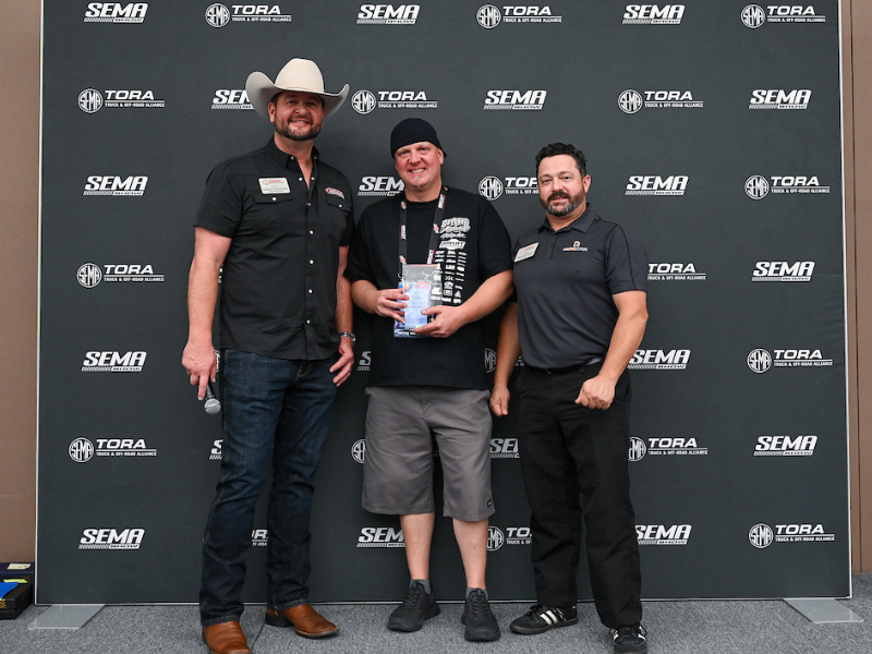 Air Lift Company poses with award.