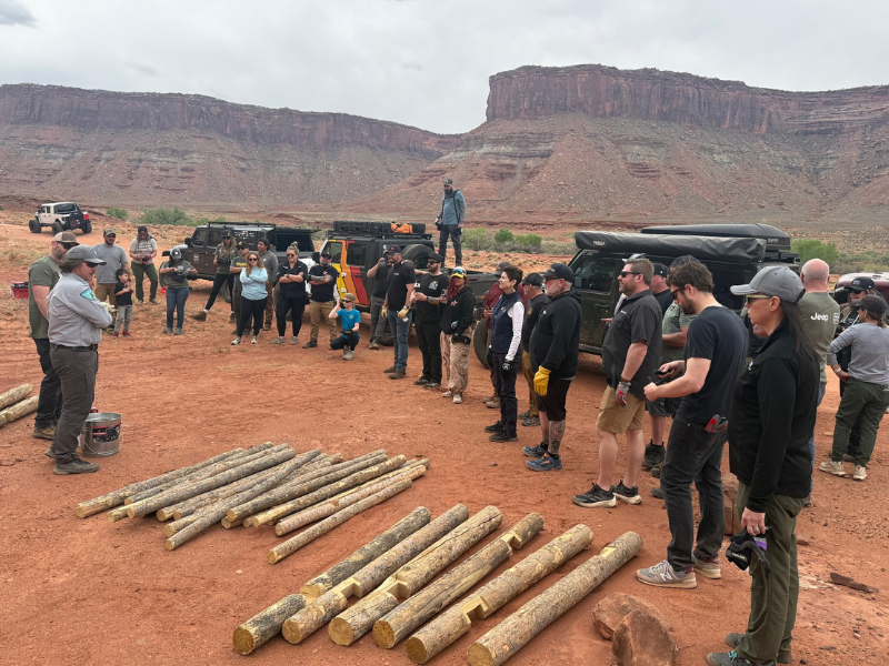 Volunteers preparing to build and repair trail fencing