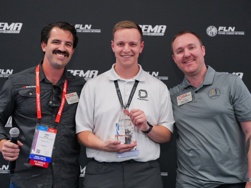 Award winner being presented with award.