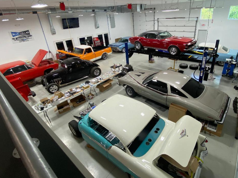 Top view of the Blue Collar garage with several cars