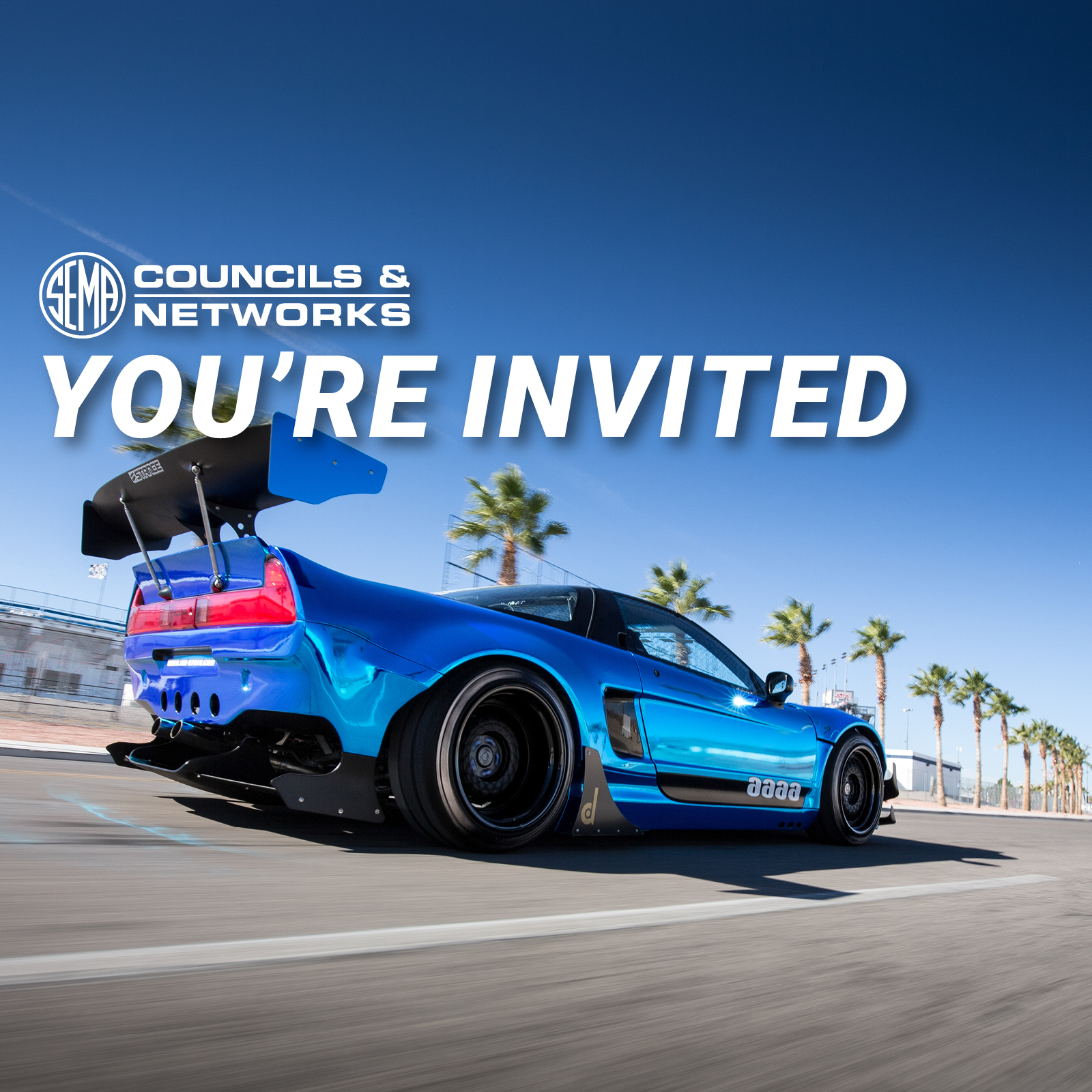 ETTN You're Invited. Sports car driving down palm tree lined road