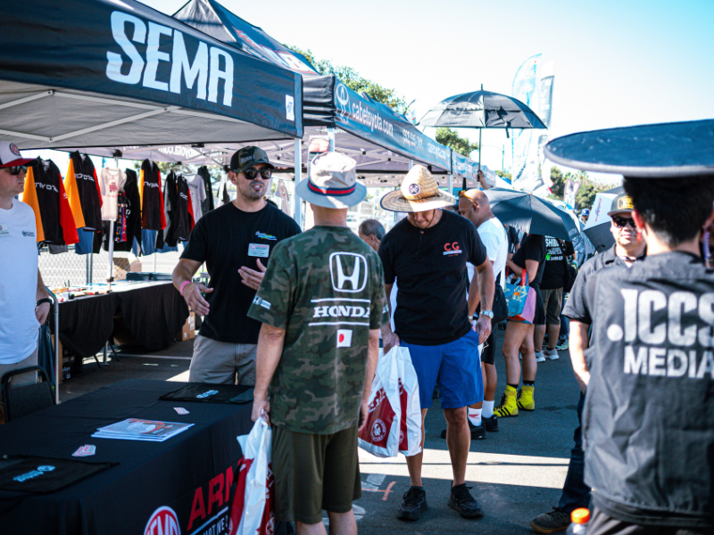 Outdoor vendors speaking with customers