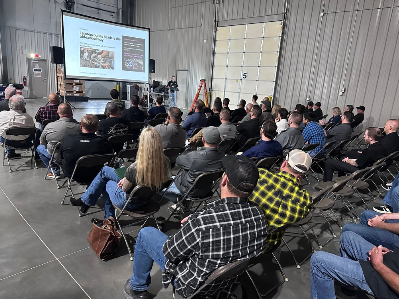 Attendees listen at a seminar at the SEMA Fuel Your Future event