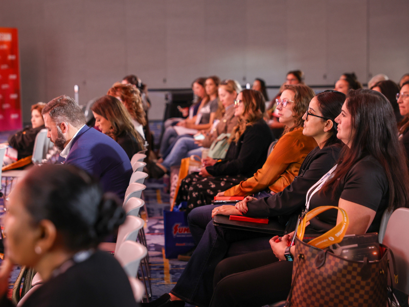 People seated listening to an SBN education session