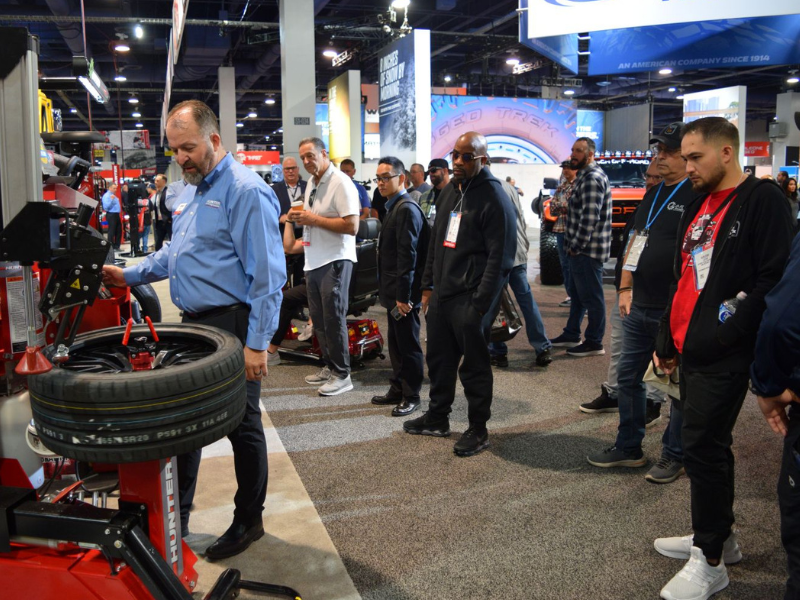 SEMA Show attendees watch a tire demonstration