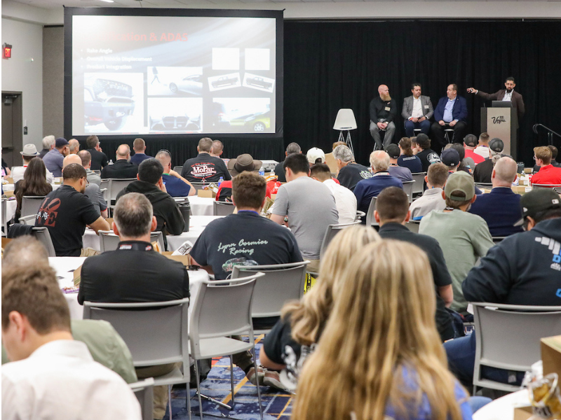 Attendees listen to presentation at a SEMA Education sponsored session