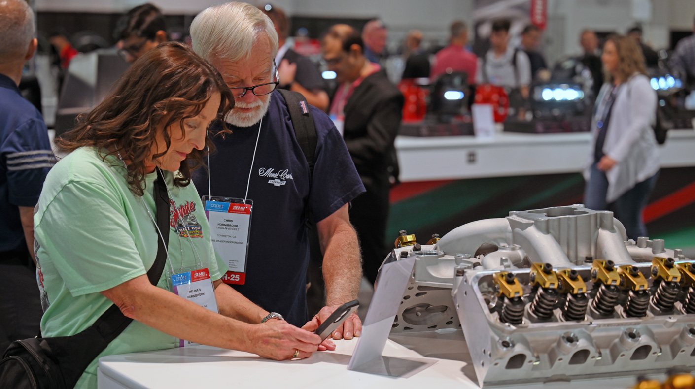 2025 SEMA Show New Products Showcase - Visitors capture product highlights to share with colleagues and customers back home.