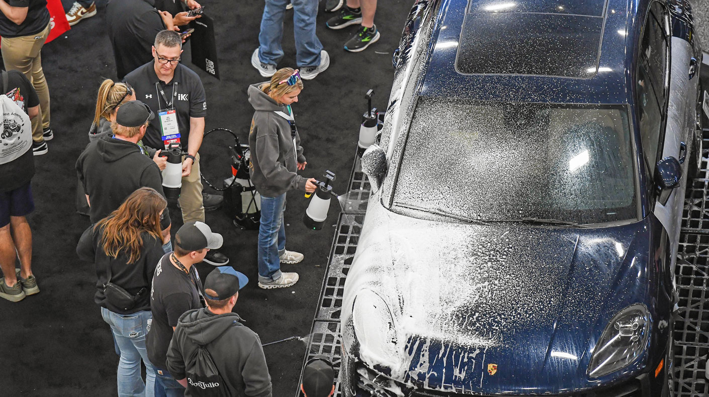 SEMA Show attendee conducting a product demo at the SEMA Show