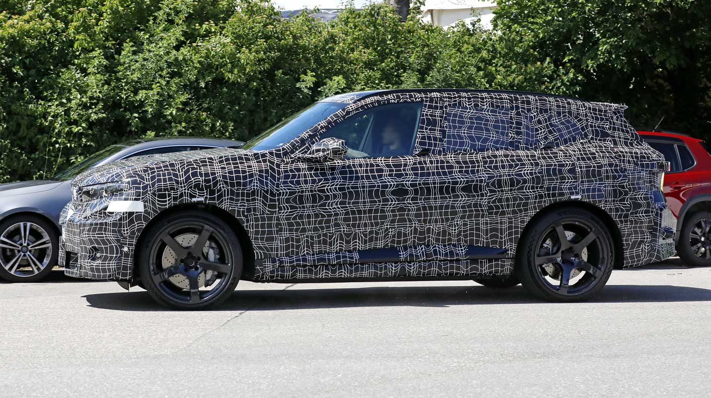 An image of the camouflaged BMW iX5 M.