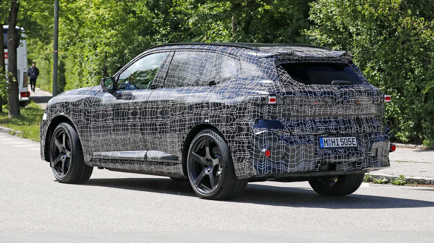 An image of the camouflaged BMW iX5 M.