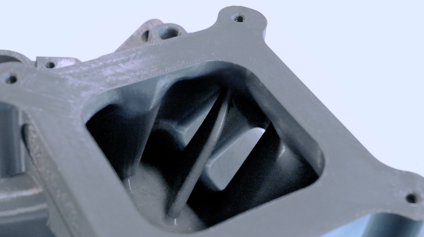 An image of a 3D printed intake manifold.