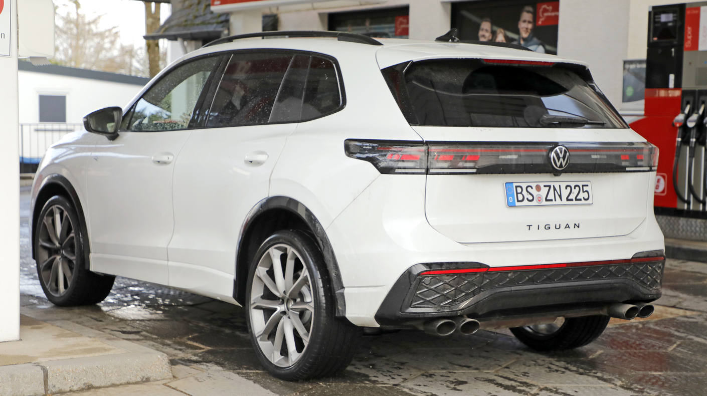 An image of a VW Tiguan R towards the back of the vehicle at the gas pump.