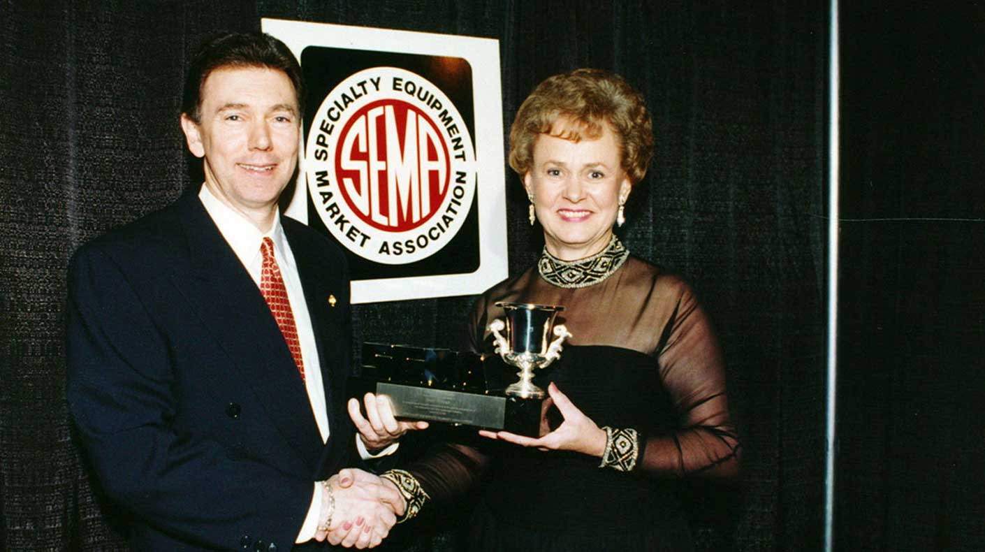 Joan Weiand accepts SEMA Hall of Fame award.