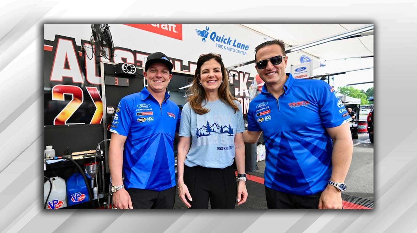 An image of New Hampshire Governor Kelly Ayotte at an NHRA track.