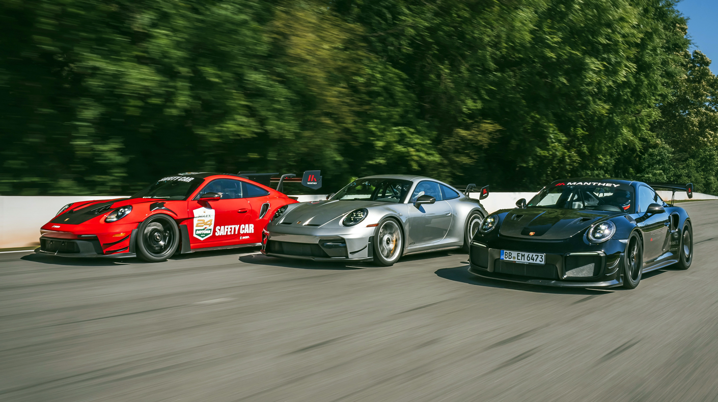 An image of the Porsches on the race track.