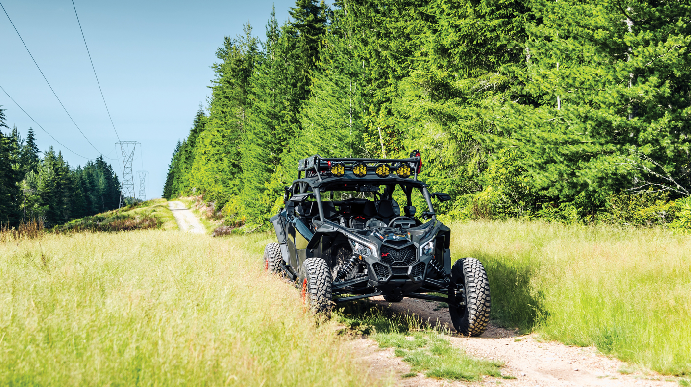 An image of a UTV on a backroad.