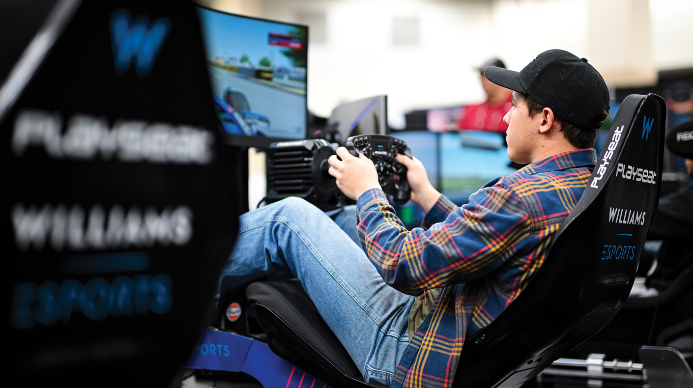 An image of a person using a racing simulator.