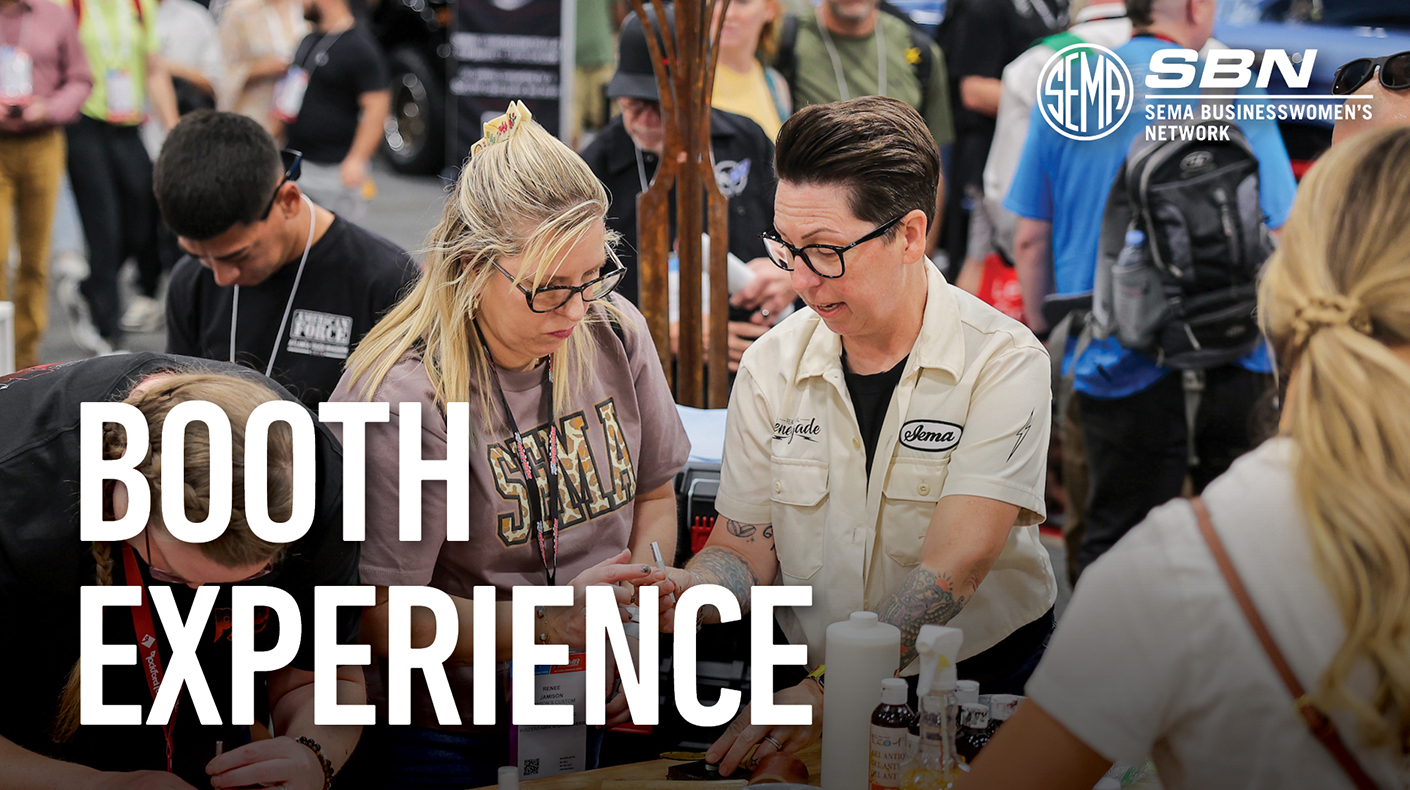 SEMA Show attendees doing a workshop in the SBN booth.