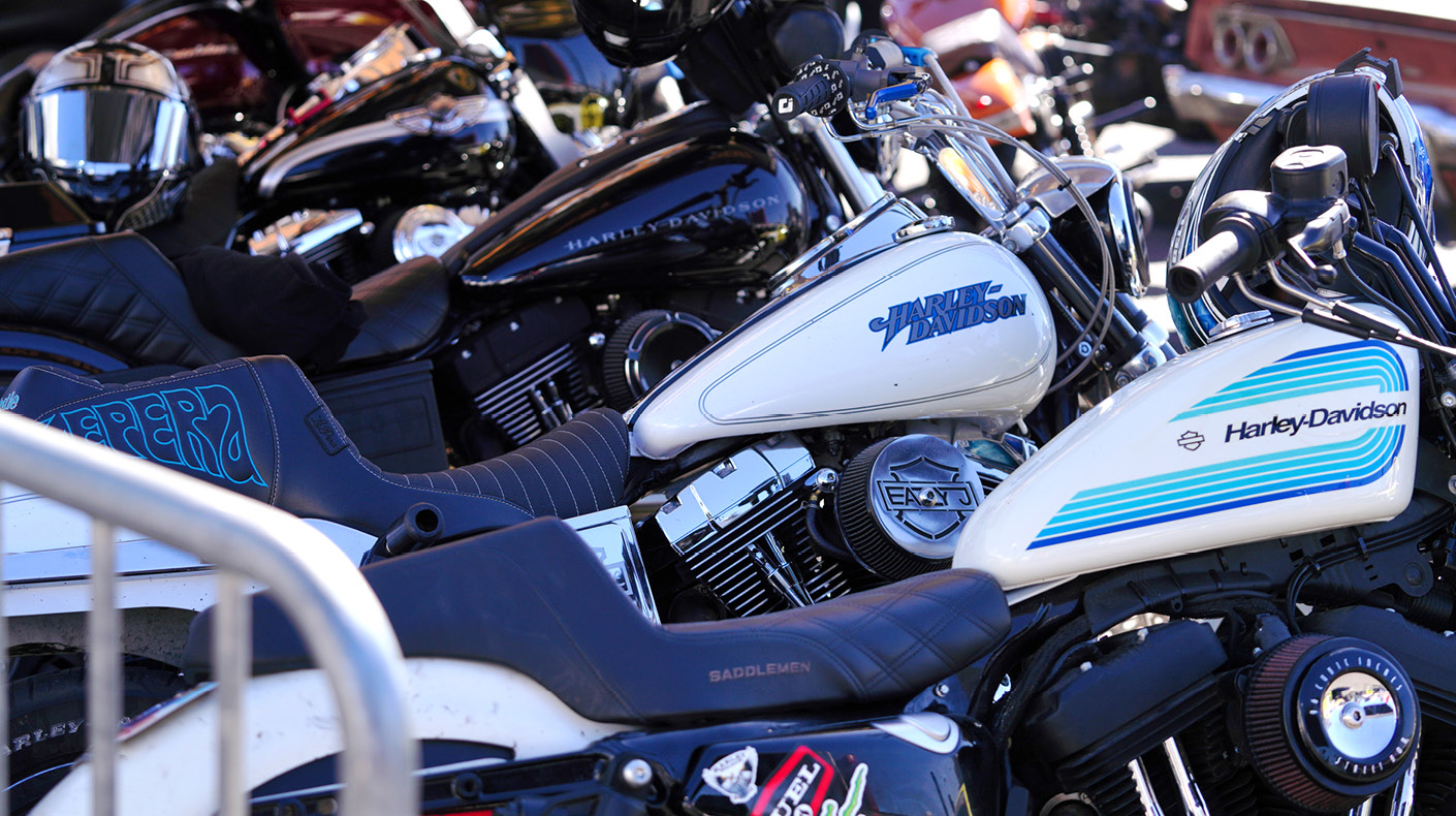 A row of motorcycles at the SEMA Show.
