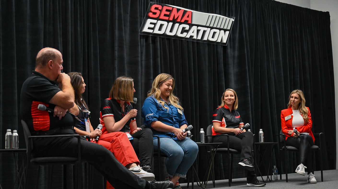 A SEMA Education panel on stage at the SEMA Show.