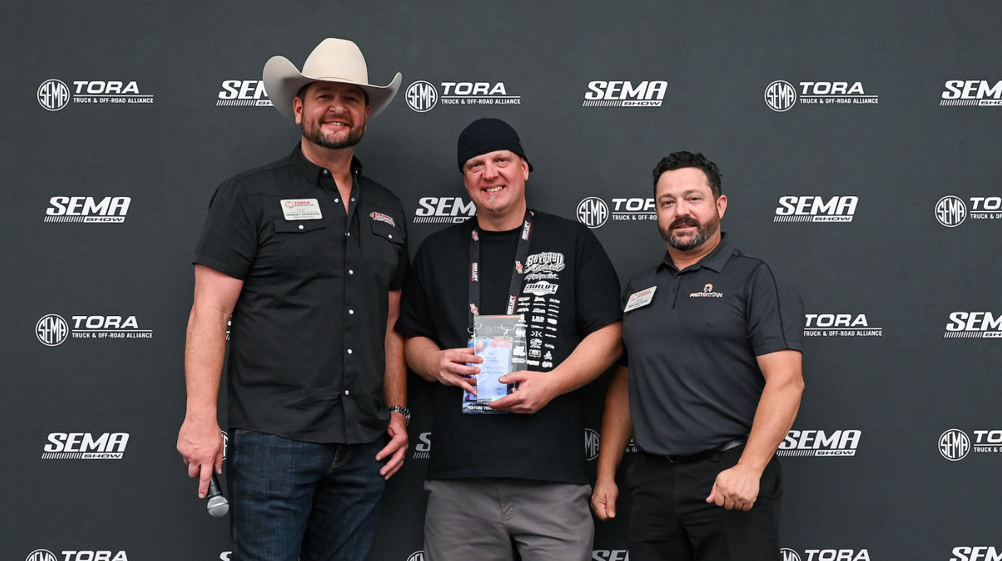 Air Lift Company accepts the TORA Feature Vehicle Best in Show Award.
