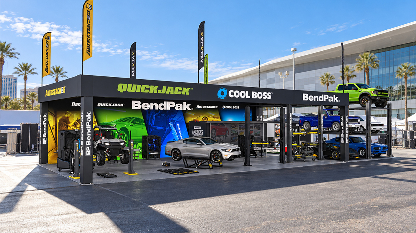 BendPak outdoor booth visual with vehicle lifts and displays from its many equipment brands.