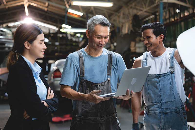 A technician discussing work with a customer