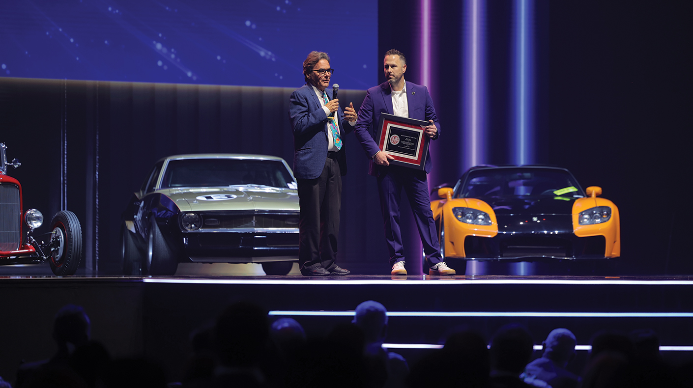 Dean Case accepting the 2025 SEMA Person of the Year award on stage at the 2025 SEMA Show