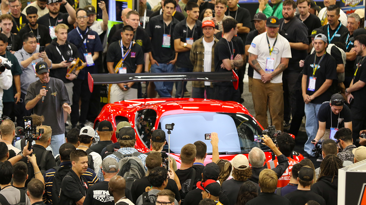 A crowded booth at the SEMA Show.