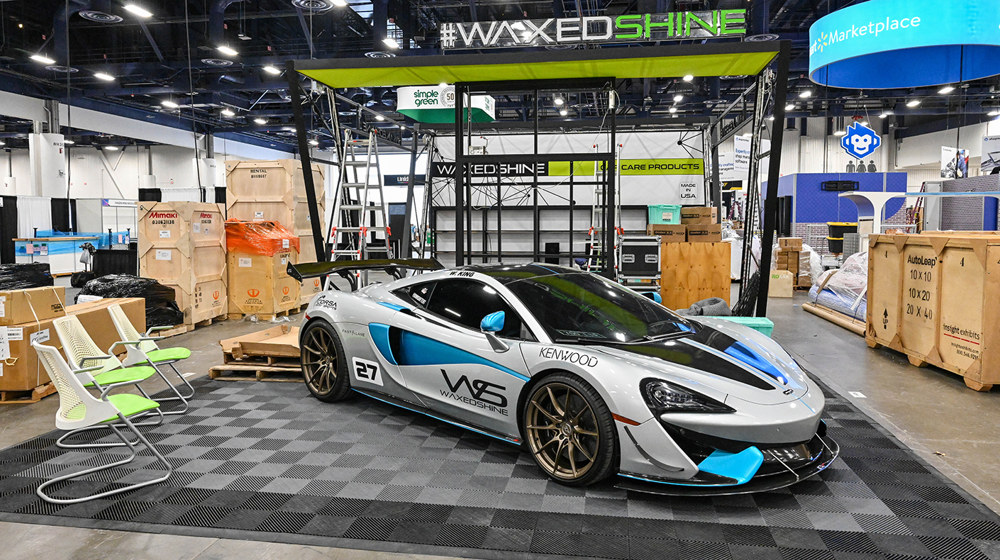 Exhibitors setting up their SEMA Show booth.