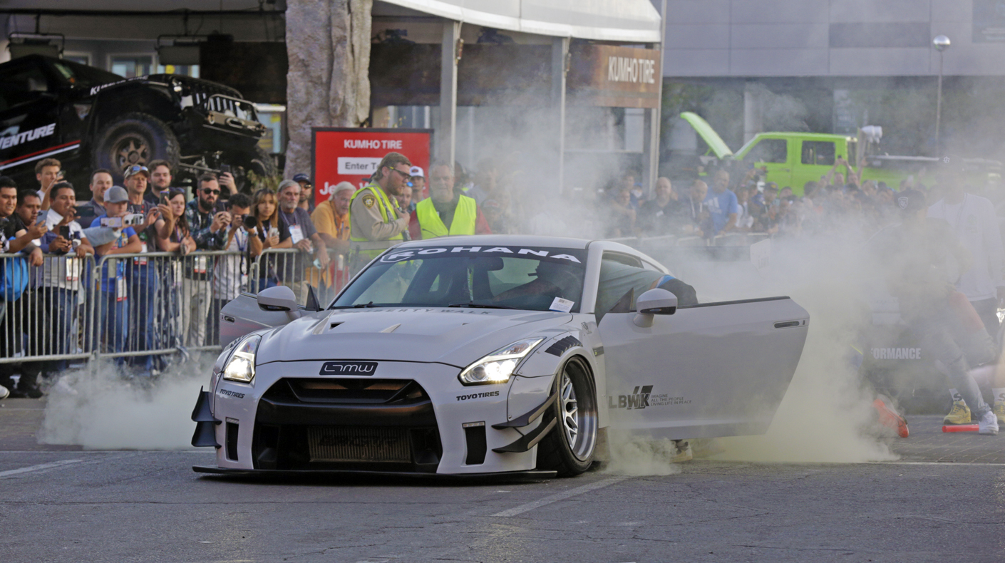 A Nissan Z smoking tires.