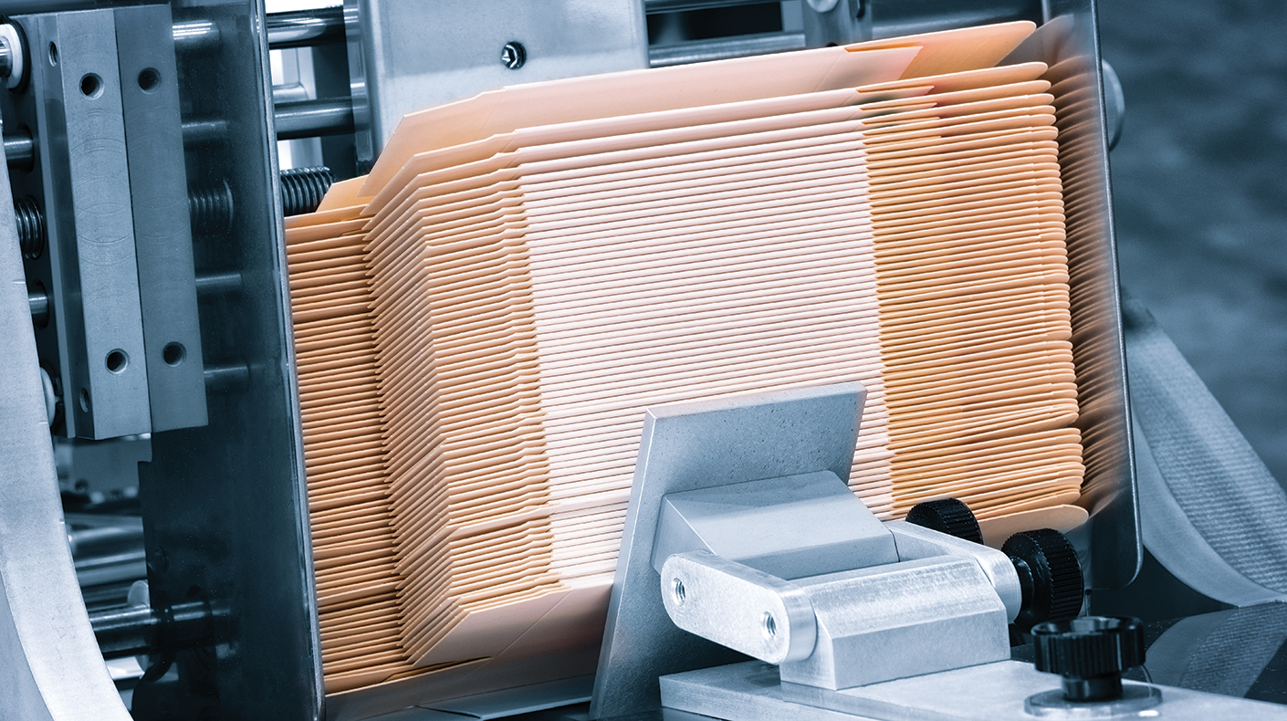 Packaging being manufactured.