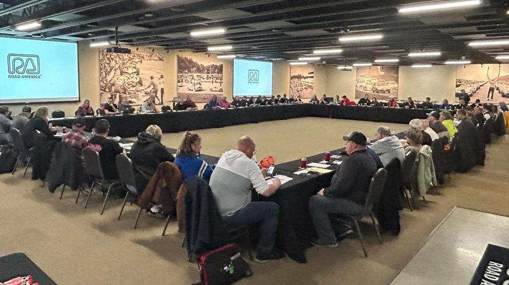 Promoters and Operators of Wisconsin meeting in a board room at Road America.