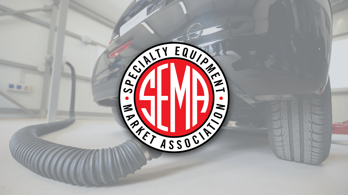 A vehicle during emissions testing with the SEMA logo. 