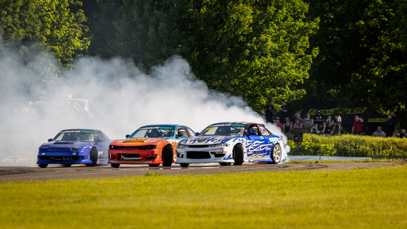Cars drifting during a GRIDLIFE event.