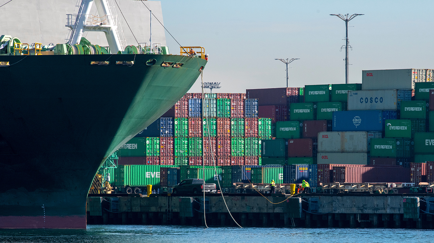 A container ship docking at a port. Image courtesy of Shutterstock and Rober V Schwemmer.