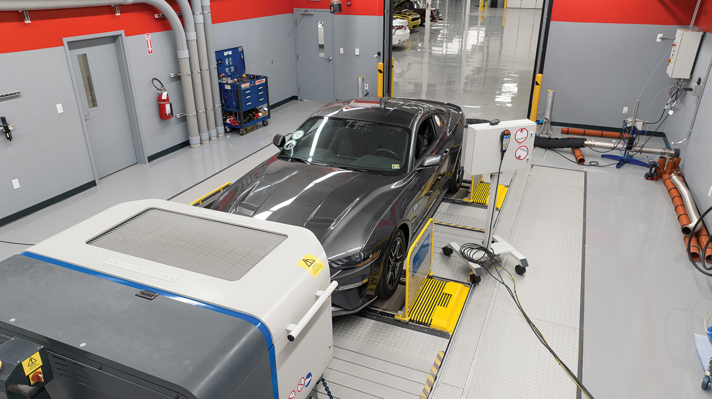 A car undergoing emissions testing at SEMA Garage.